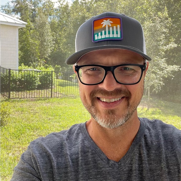 Piano keys, palm tree, and sunset patch hats. - Picture 2 of 3